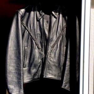 Black heavy leather motorcycle jacket. Super warm